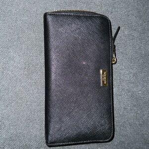 Black leather Kate Spade hand wallet